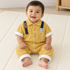 Baby boy wearing mustard yellow collared bear romper